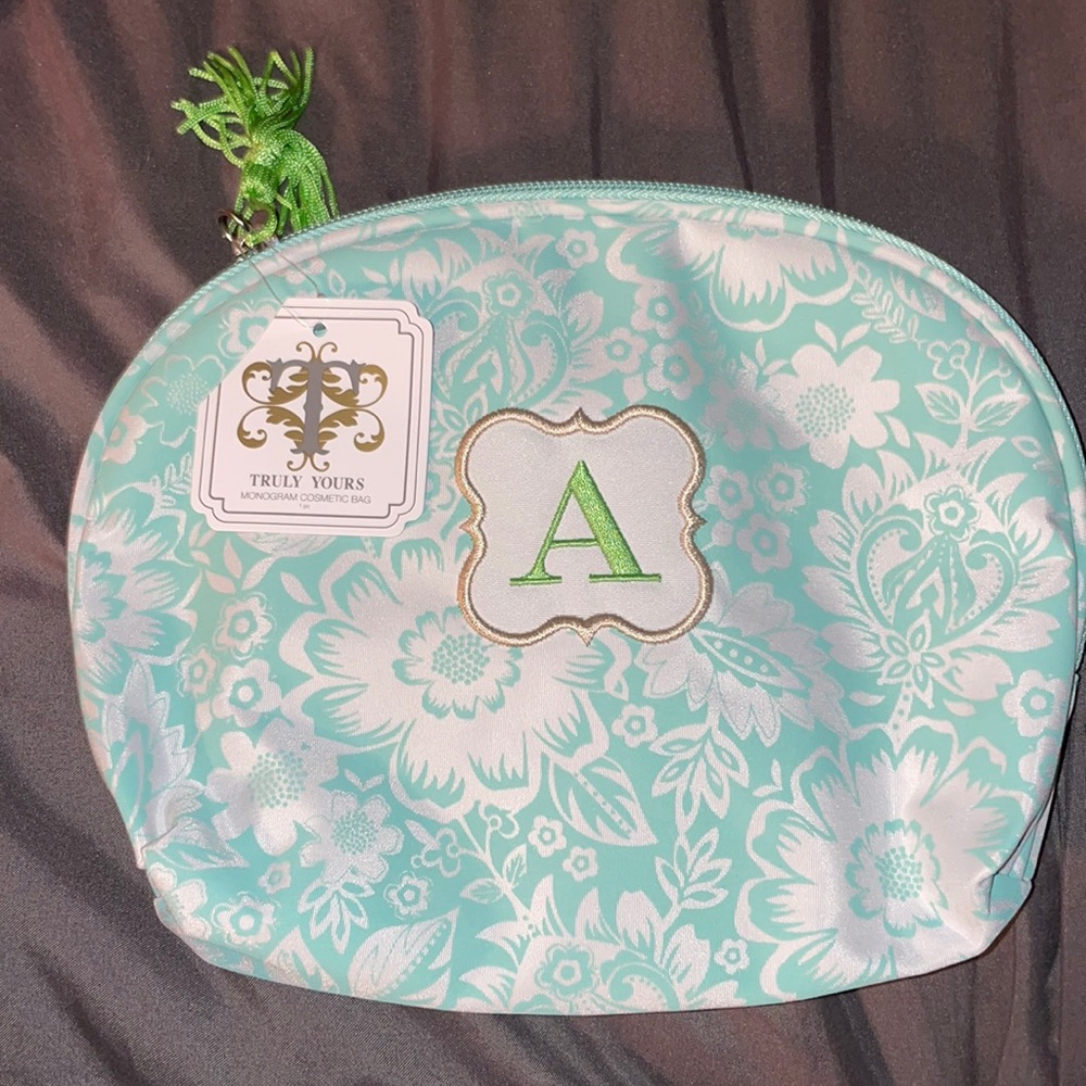 NWT green and white makeup bag
